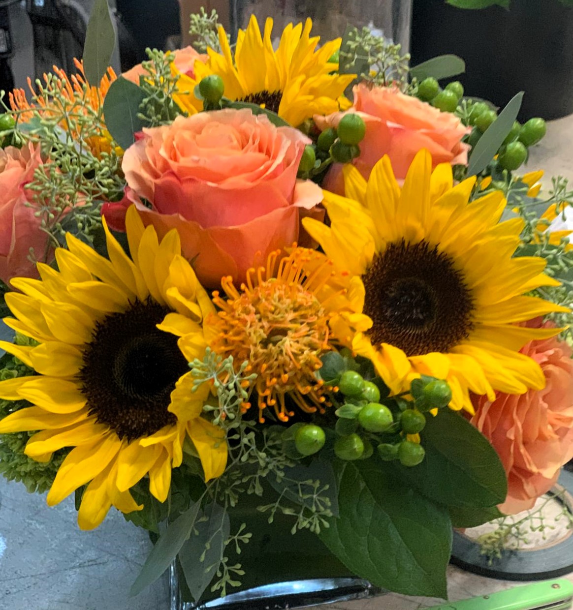 floral-bouquet-with-sunflowers-roses-and-greenery